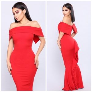 Red off the shoulder ruffle train mermaid gown